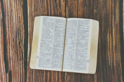 High angle view of open book on table