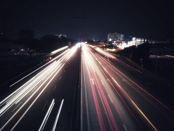 High angle view of light trails on city street
