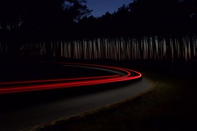 Light trails on road at night
