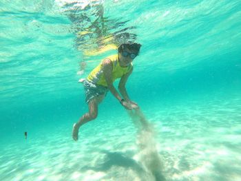 Man swimming in sea