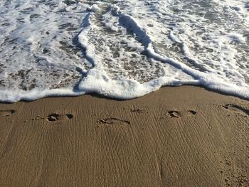 High angle view of sand on beach