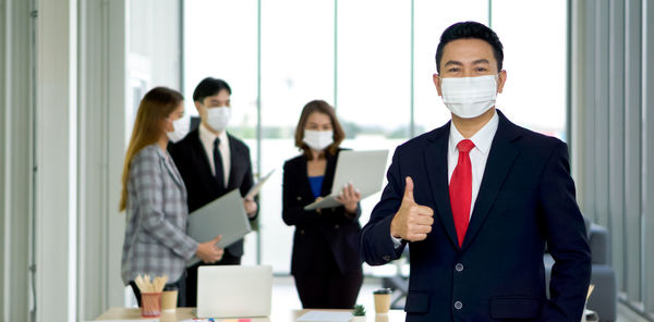 Group of people looking at camera