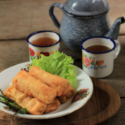 Selected focus sosis solo or fried egg crepe with minced beef or chicken filling. 