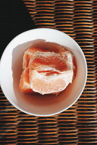 High angle view of oranges in bowl on table