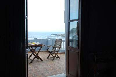 Scenic view of sea seen through window