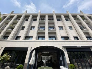 Low angle view of modern building against sky