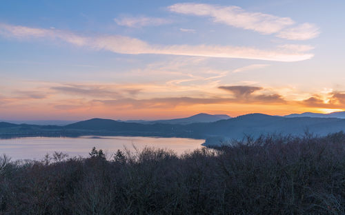 Scenic view of mountains against sky during sunset