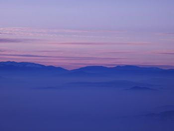 Scenic view of mountain against sky during sunset