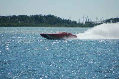 Boat in sea against sky