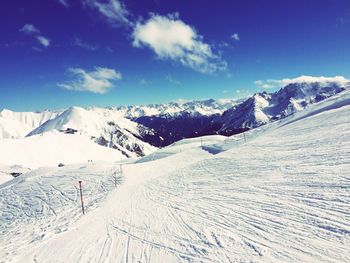 Scenic view of snow covered mountains