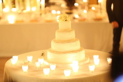 Wedding cake on the table ready for cutting by the newlyweds.