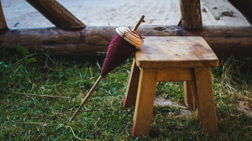 Close-up of wood on wooden table in field