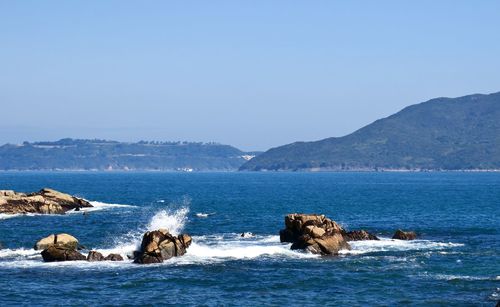 Scenic view of sea against clear sky