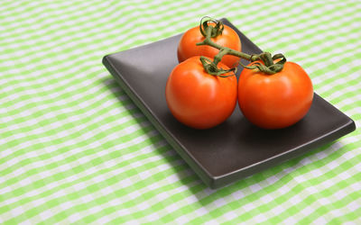 High angle view of tomatoes on table