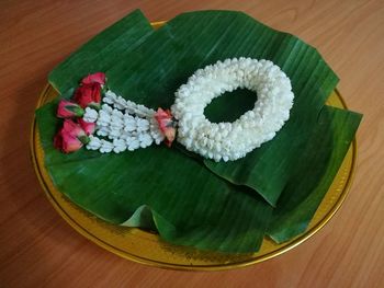 High angle view of pink flowers on table