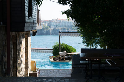 View of swimming pool by river