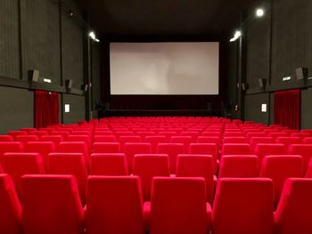 Empty chairs in movie theater 