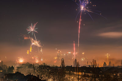 Firework display at night