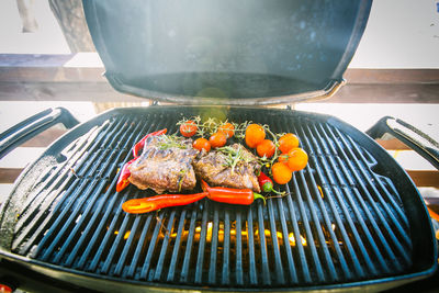 Close-up of food roasting on barbecue grill