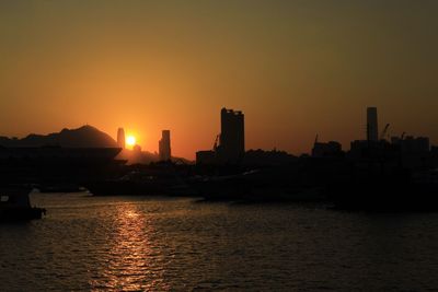 Silhouette of buildings at sunset