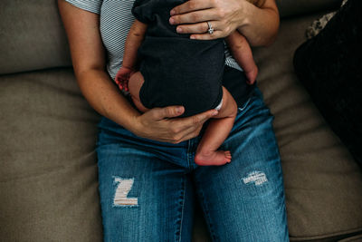 Overhead of woman holding a newborn baby