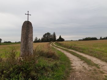 Scenic view of farm against sky