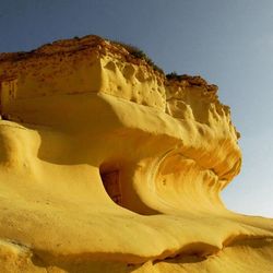 Low angle view of rock formations