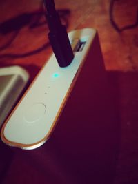 High angle view of smart phone on table