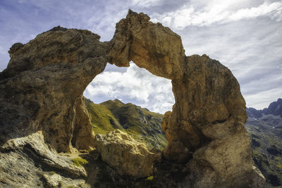 Scenic view of rock formation against sky