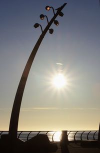 Close-up of silhouette plants against sky during sunset
