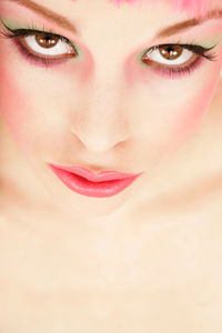 Close-up of beautiful woman with pink lipstick