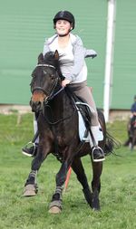 Woman riding horse