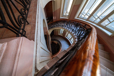 Low angle view of spiral staircase of building