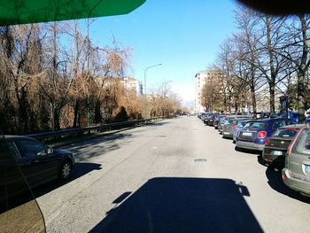 Cars on road against sky