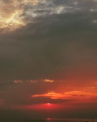 Scenic view of dramatic sky during sunset