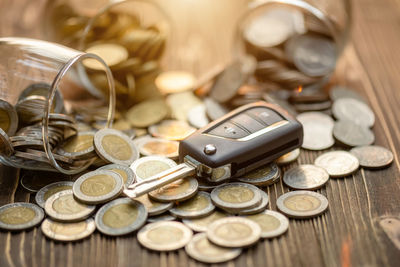 High angle view of coins on table