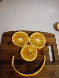 High angle view of fruits on cutting board