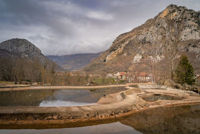 Mountains and trees reflecting in artificial ponds. pyrenees mountains. france