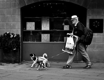 Man playing with dog