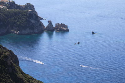 High angle view of rocks in sea