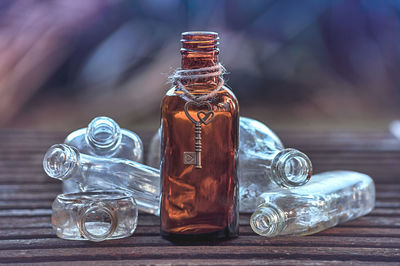 Close-up of glass bottles on table