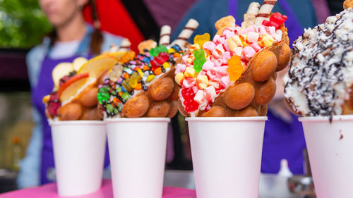 Close-up of multi colored candies on table