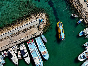 High angle view of boats moored on sea