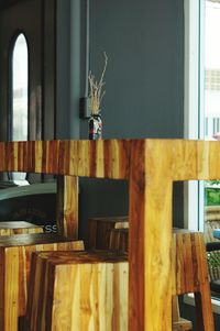 Close-up of wooden table at home