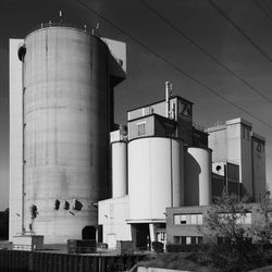 Old factory against sky