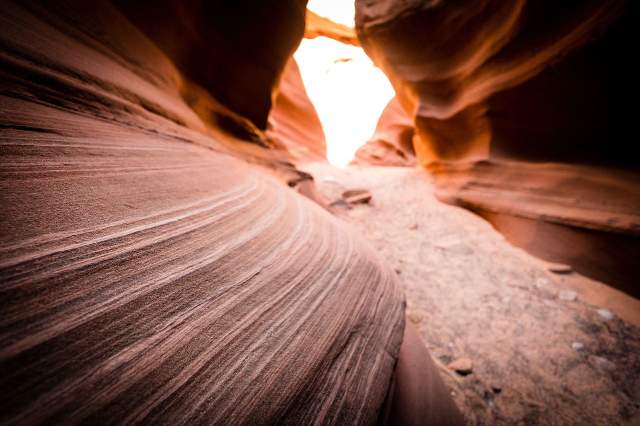 CLOSE-UP OF ROCK FORMATION IN SUNLIGHT