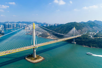 Aerial view of suspension bridge over river