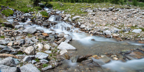 Stream flowing through rocks