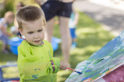 Close-up of boy painting