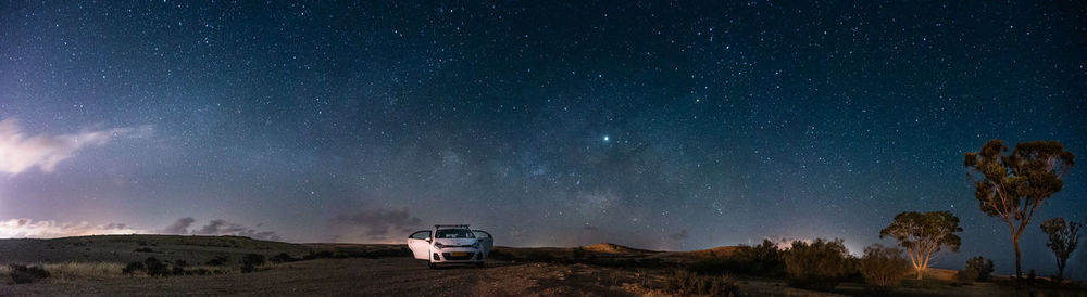 Scenic view of star field against sky at night
